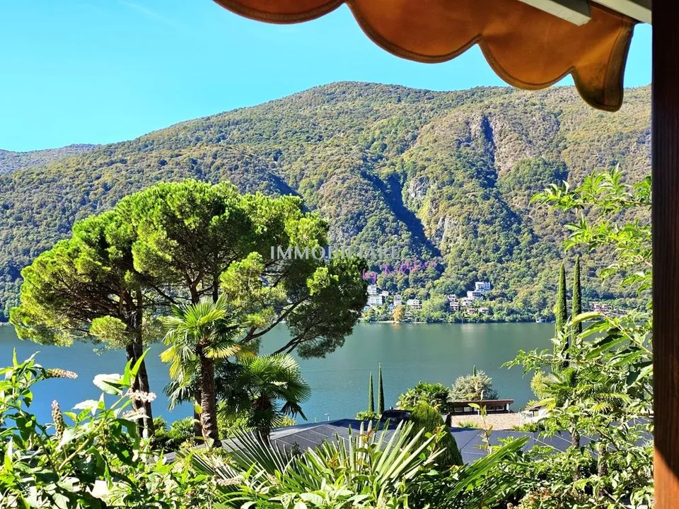 Wohnung in Villa: Erdgeschoss mit Garten, Terrasse und Seeblick