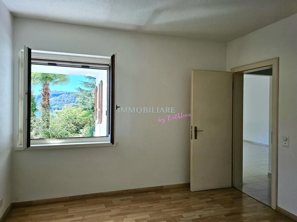 Wohnung in Villa: Erdgeschoss mit Garten, Terrasse und Seeblick