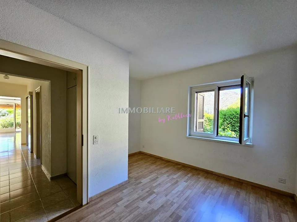 Wohnung in Villa: Erdgeschoss mit Garten, Terrasse und Seeblick