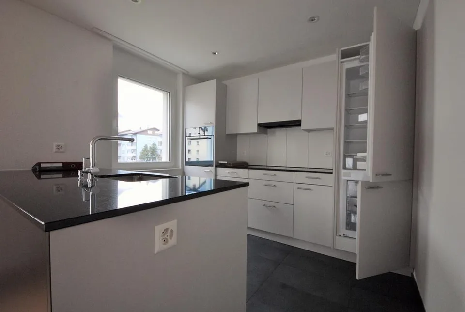 Moderne Wohnung mit Gartensitzplatz