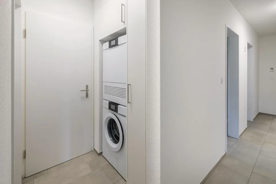 Charming 3-room apartment with seating area and laundry tower