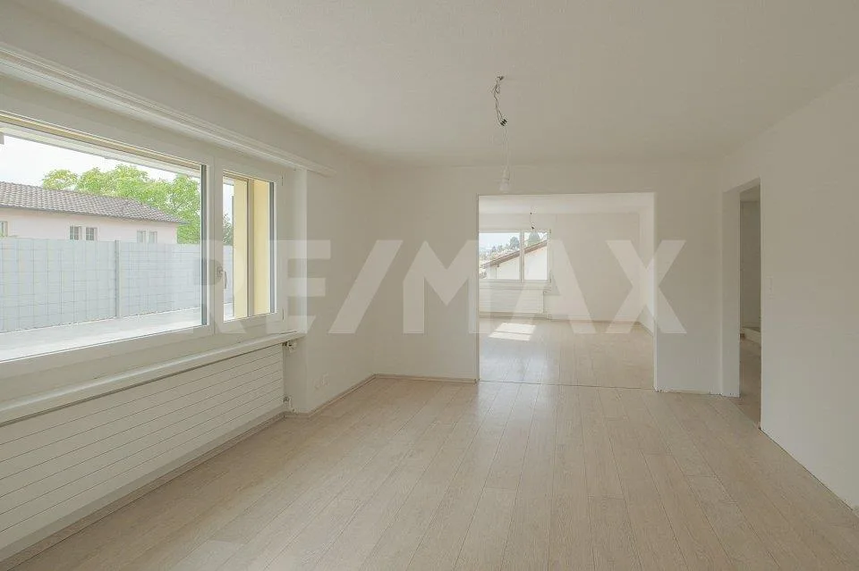 Una casa piena di possibilità in una zona residenziale popolare – foto 3 di 13