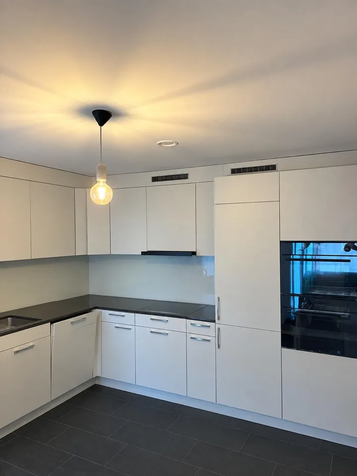 Moderne 2.5-Zimmer-Neubaugartenwohnung im Herzen von Wettingen