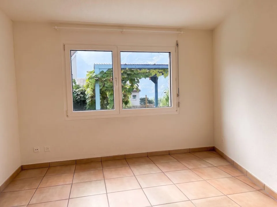 Idyllische Gartenwohnung mit Seesicht