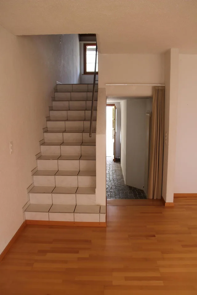 einseitig angebautes EFH mit Einzelgarage und eigener Wärmepumpe