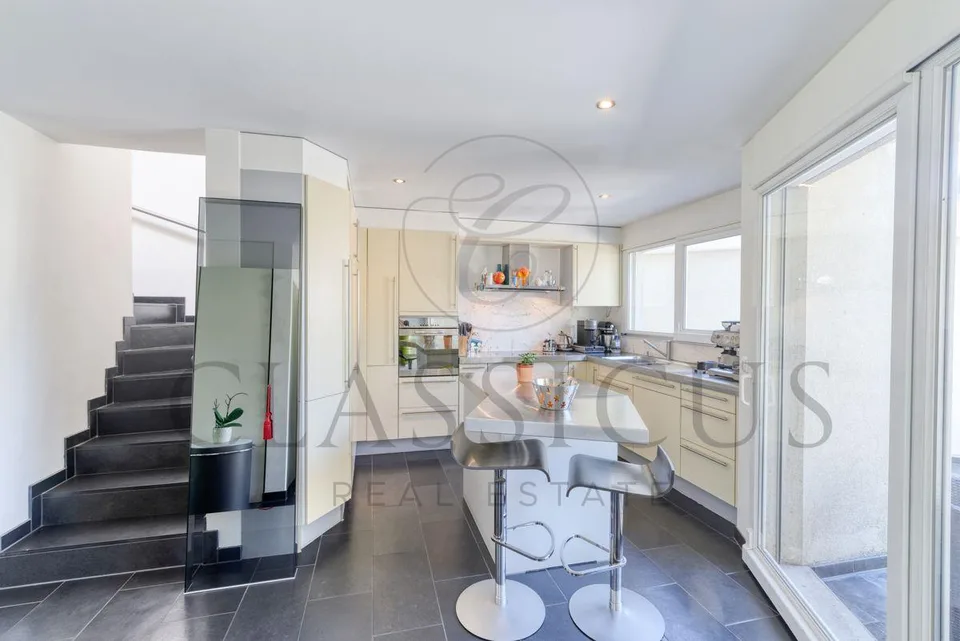 Maison familiale en pignon avec jardin privatif, véranda et 4 stationnements – photo 6 sur 26
