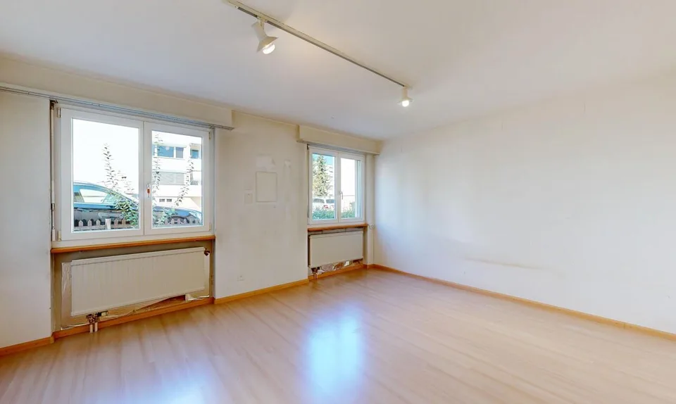 Appartement douillet avec jardin, garage et deux places de parking extérieures – photo 5 sur 11
