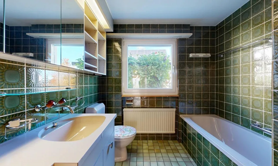 Appartement douillet avec jardin, garage et deux places de parking extérieures – photo 8 sur 11