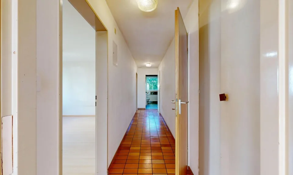 Appartement douillet avec jardin, garage et deux places de parking extérieures – photo 4 sur 11