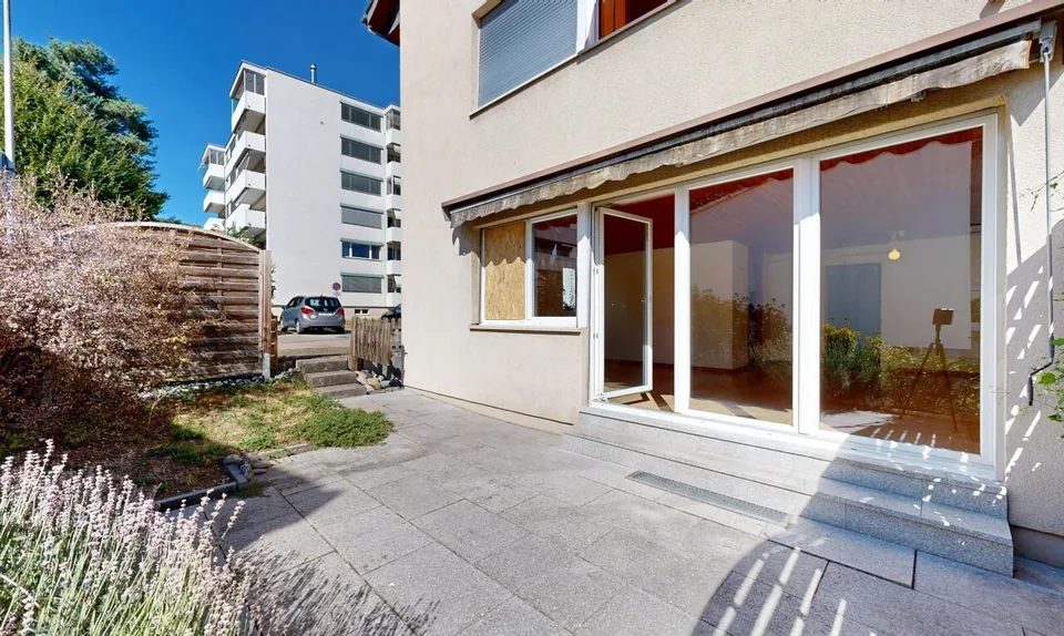 Appartement douillet avec jardin, garage et deux places de parking extérieures – photo 2 sur 11