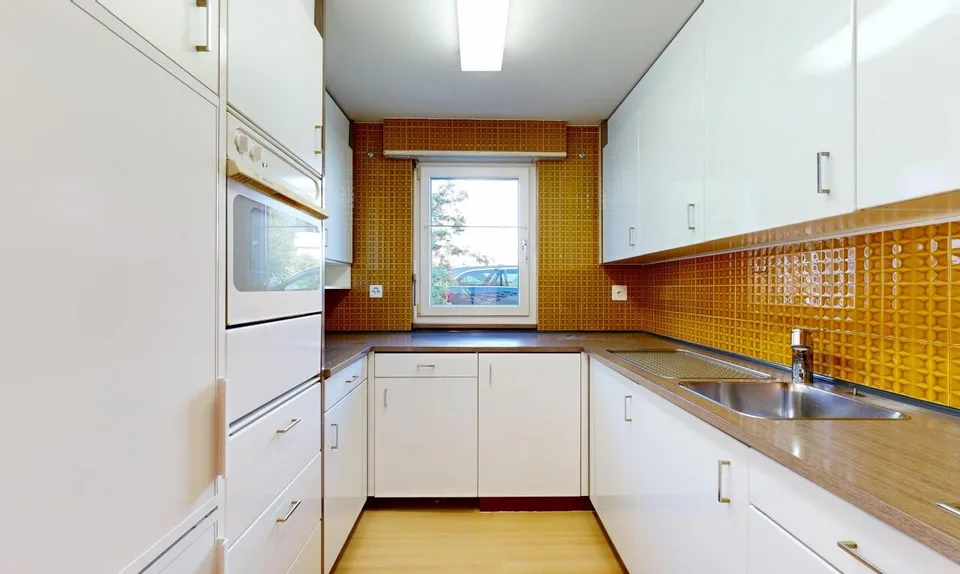 Appartement douillet avec jardin, garage et deux places de parking extérieures – photo 3 sur 11