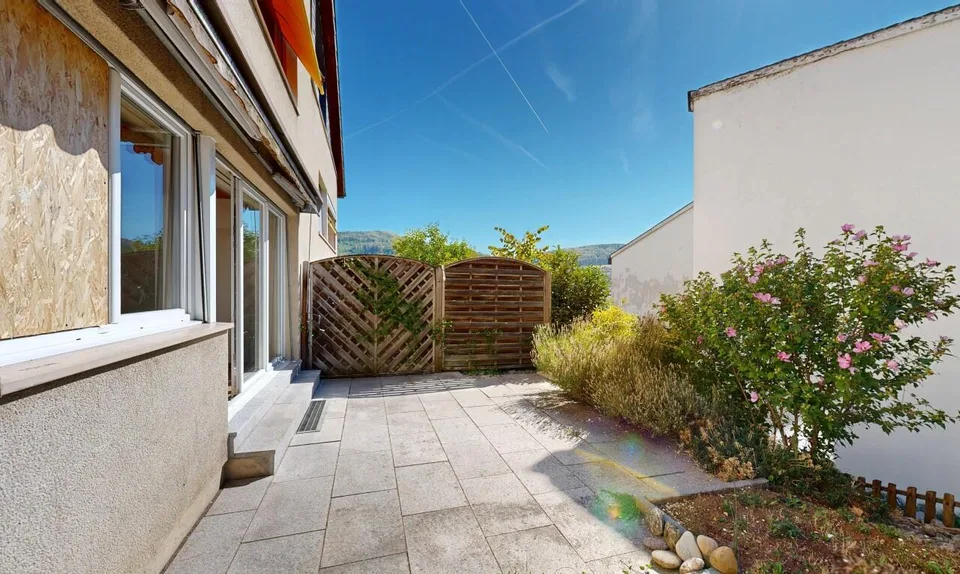 Appartement douillet avec jardin, garage et deux places de parking extérieures – photo 9 sur 11