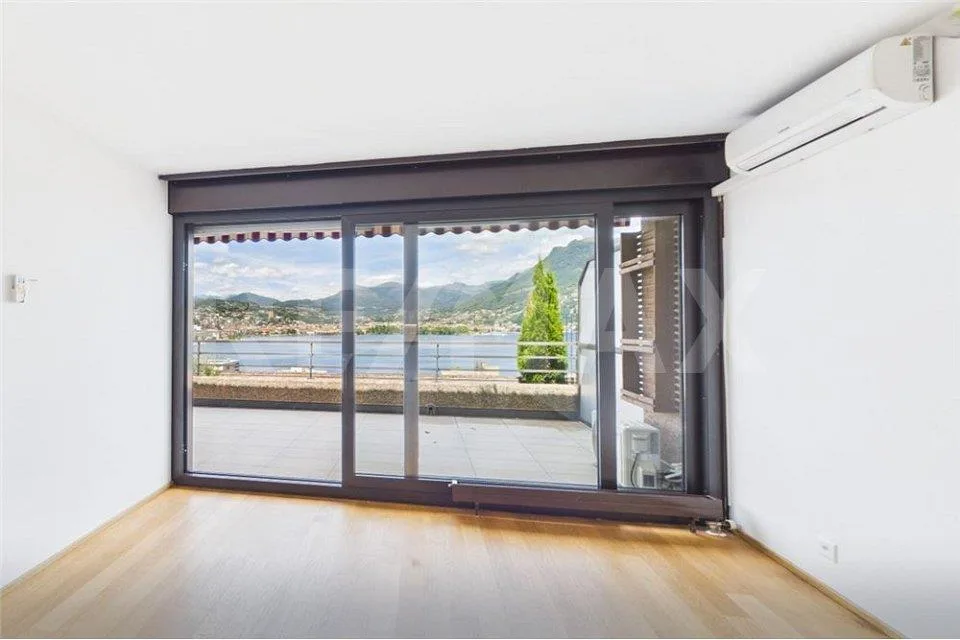 Vista mozzafiato sul golfo di Lugano elegante appartamento con terrazza – Foto 7 von 13