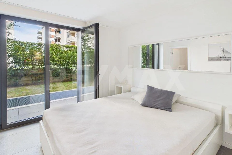 Moderno appartamento con giardino a Massagno – comfort e privacy – Foto 9 von 13