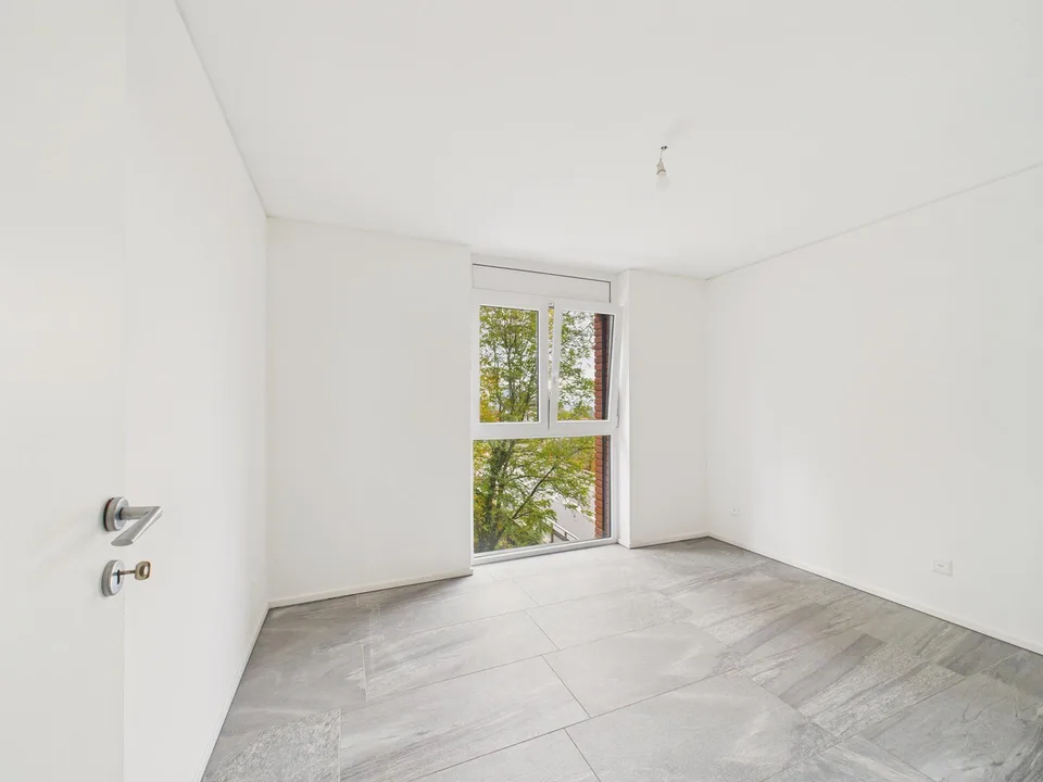 Moderno appartamento 3.5 locali con terrazza e locale hobby a Cadro... – Foto 6 von 14