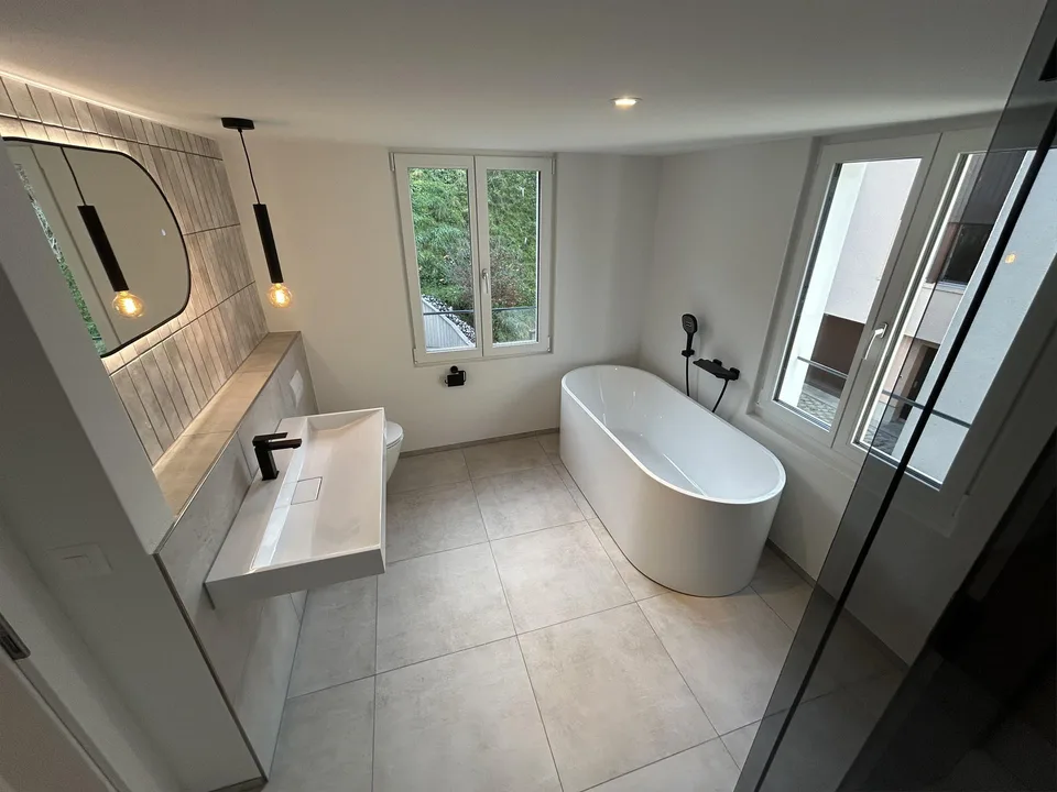 modernes Zuhause mit Einliegerwohnung – Foto 10 von 15
