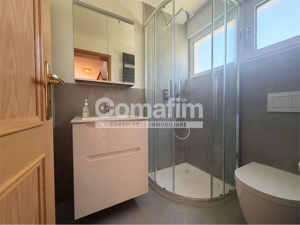 Spaziosa casa bifamiliare con giardino in zona tranquilla a Cadro – Foto 13 von 13