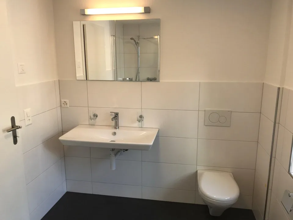 Moderne Wohnung mit gedecktem Aussensitzplatz