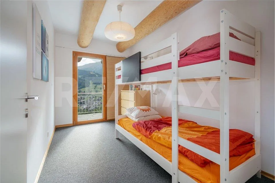 Alpencharme aus Rundholz - Wohnen mit Weitblick an der Lenk – Foto 9 von 13