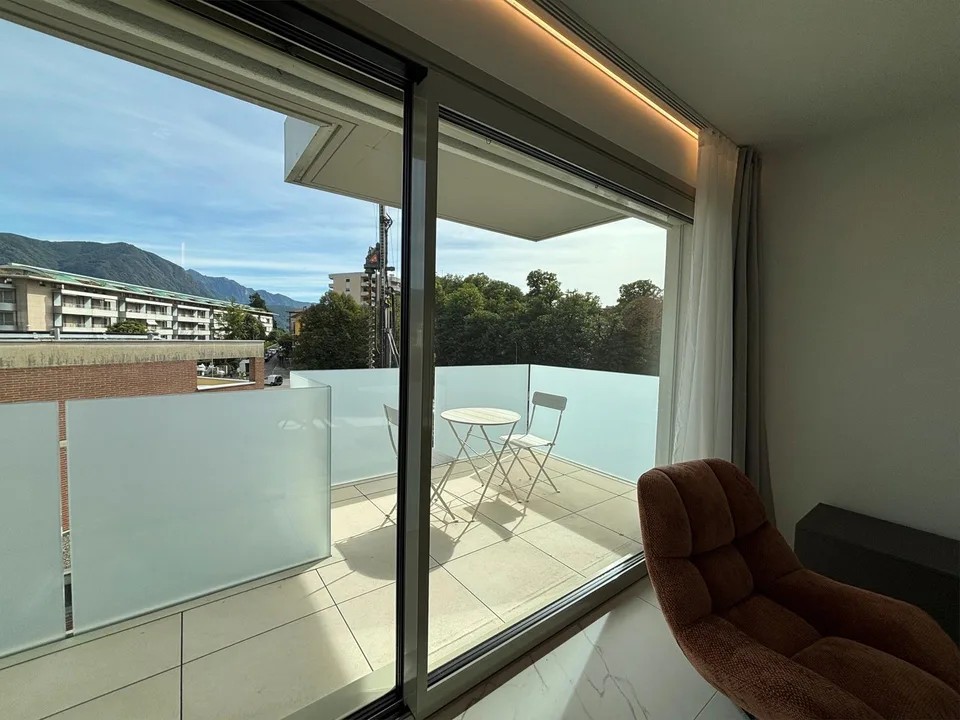 Elegante 3.5 locali a Massagno con roof garden vista lago – photo 3 of 10