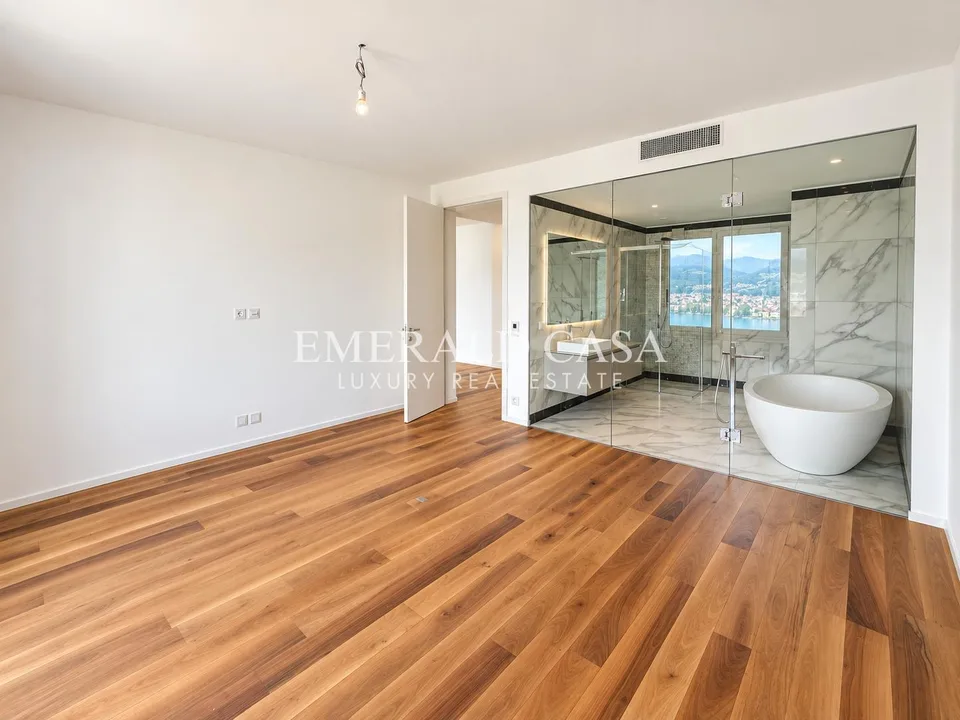 Esclusivo 4.5 locali con vista panoramica sul Lago di Lugano – Foto 5 von 10
