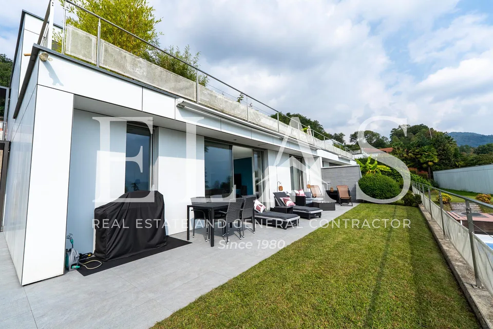 Elegante 2.5 locali con giardino privato e piscina condominiale – photo 3 sur 12