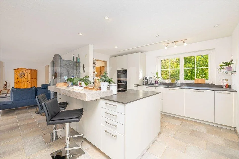 Detached single-family house with a far-reaching view, winter garden & feel-good ambiance – photo 6 of 13