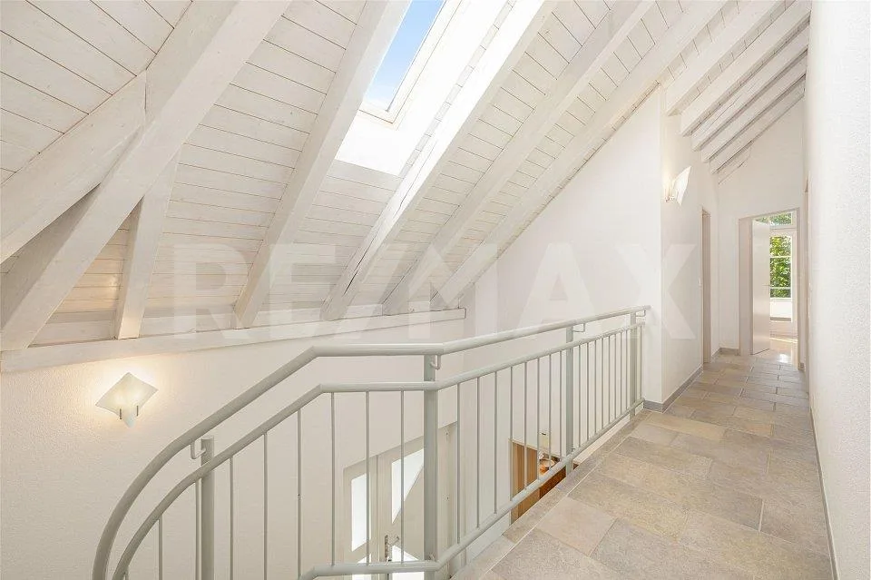 Detached single-family house with a far-reaching view, winter garden & feel-good ambiance – photo 9 of 13