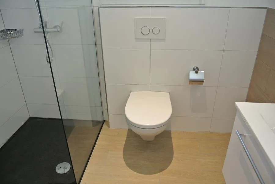 4.5-ZI-Parterre-Wohnungen - gedeckter Sitzplatz mit Grünfläche – photo 10 sur 11