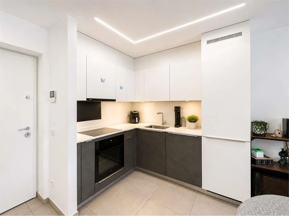 Cadempino: moderno 2.5 locali con balcone e posto auto – photo 4 of 7