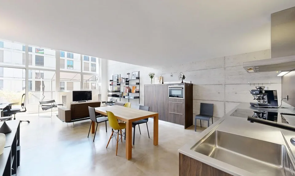 Duplex loft of 100 m² in the former Suchard factory in Serrières – photo 5 of 13