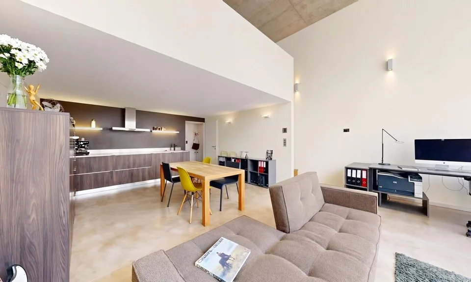 Duplex loft of 100 m² in the former Suchard factory in Serrières – photo 4 of 13
