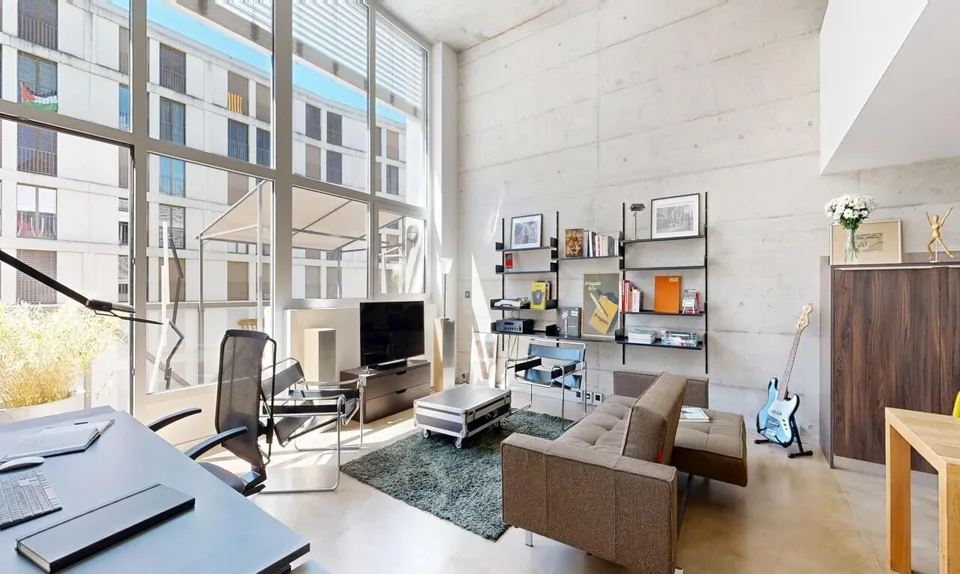 Duplex loft of 100 m² in the former Suchard factory in Serrières – photo 8 of 13
