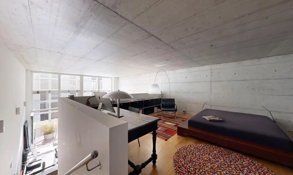 Duplex loft of 100 m² in the former Suchard factory in Serrières – photo 10 of 13