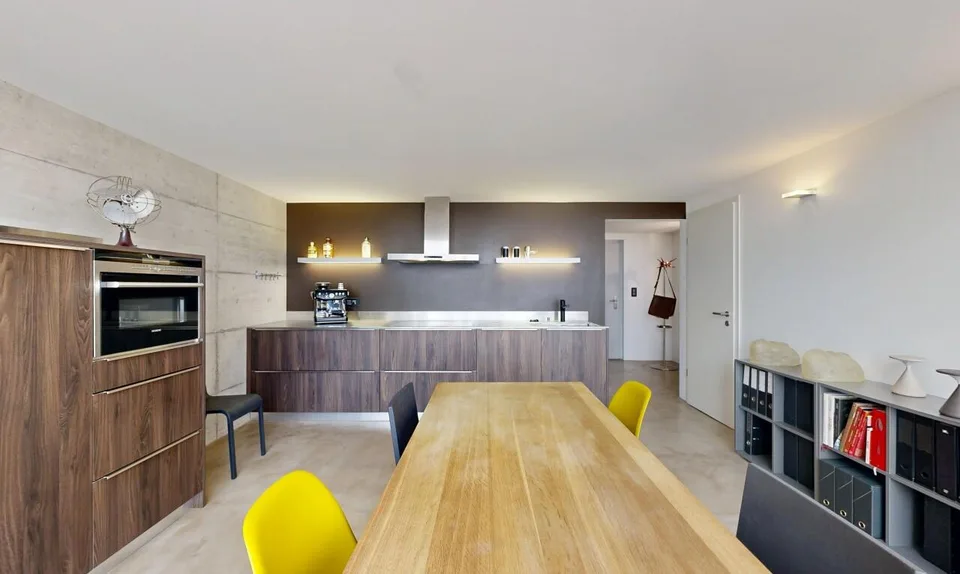Duplex loft of 100 m² in the former Suchard factory in Serrières – photo 12 of 13