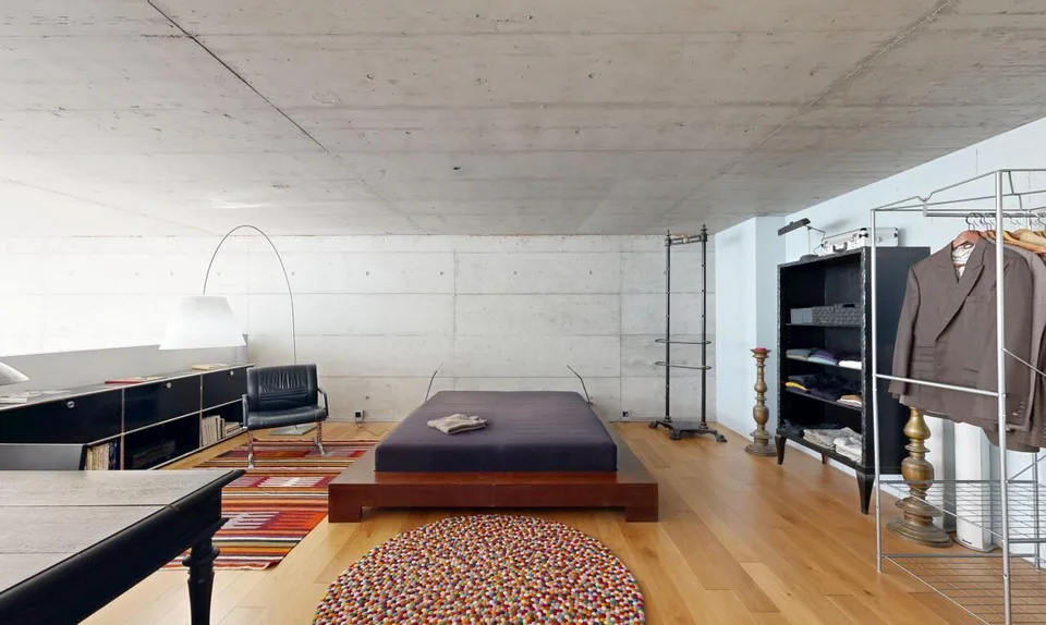 Duplex loft of 100 m² in the former Suchard factory in Serrières – photo 11 of 13