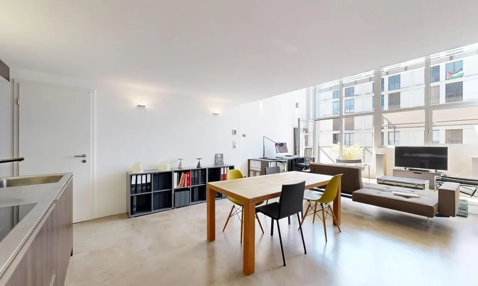 Duplex loft of 100 m² in the former Suchard factory in Serrières – photo 7 of 13