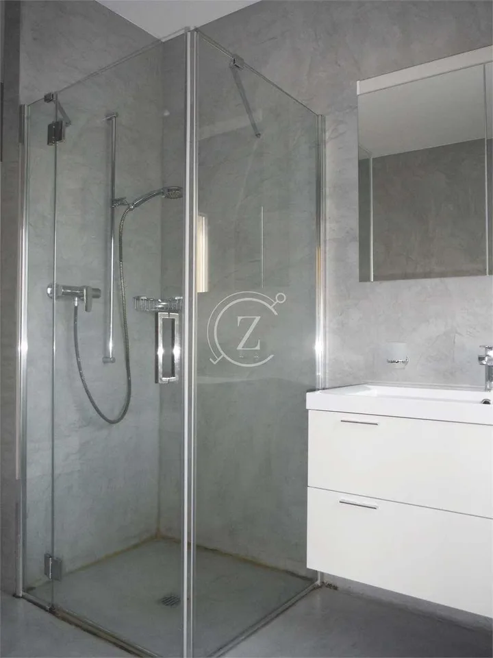 Elegante attico di 3.5 locali con vista panoramica e piscina condomini – Foto 13 von 13
