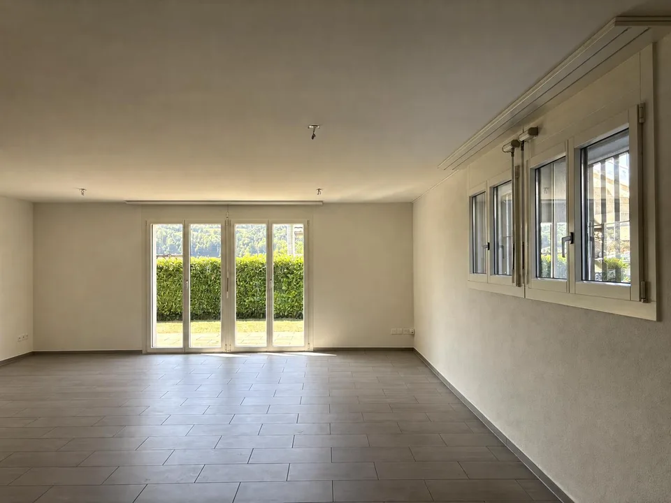 Charmant appartement 2,5 pièces avec jardin et espace de détente – photo 4 sur 9