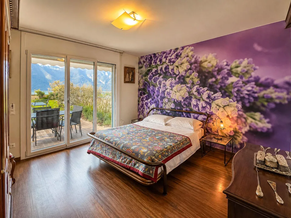 Appartamento vista lago con giardino a Bissone – foto 4 di 13