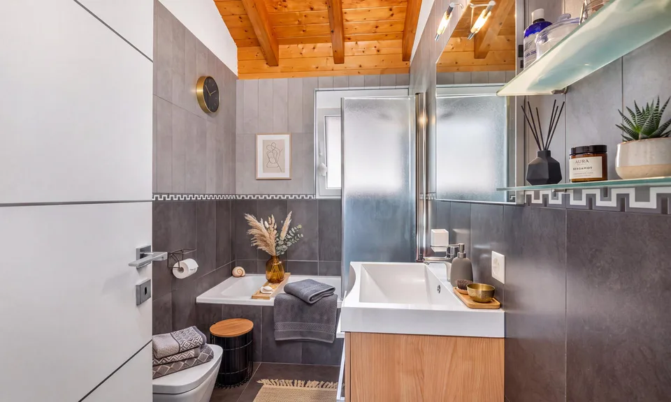 MODERNO ATTICO DI 3.5 LOCALI CON TERRAZZA A VILLA LUGANESE – Foto 7 von 13