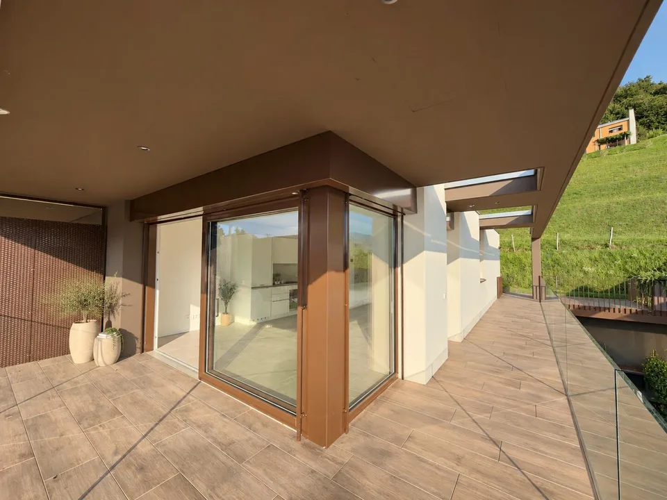 NUOVO ATTICO 2.5 LOCALI CON TERRAZZA VISTA LAGO A ROVIO – foto 3 di 12