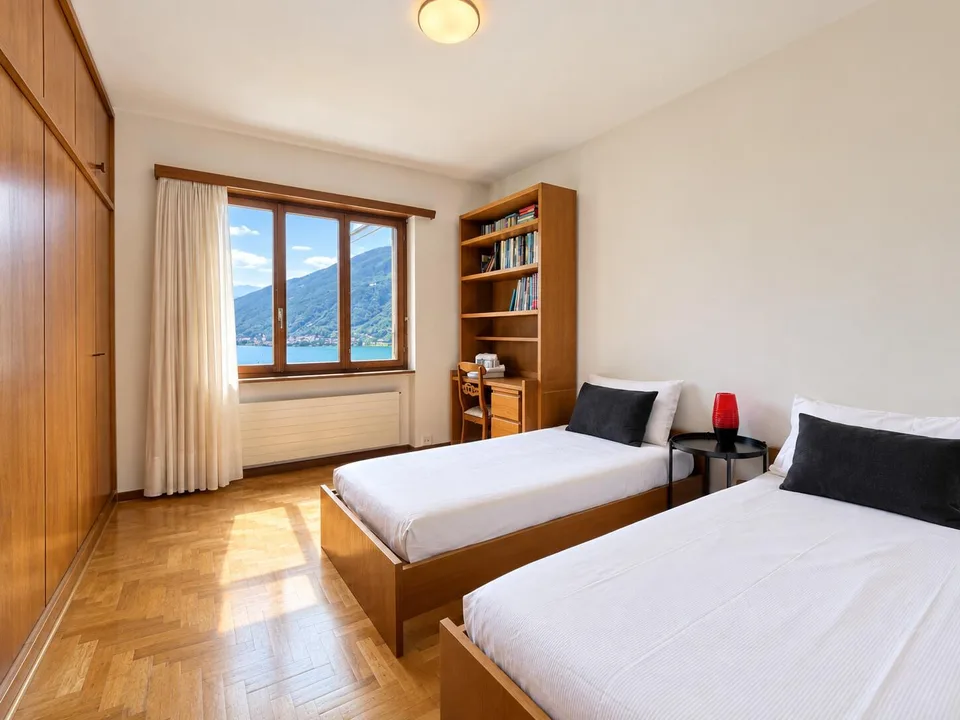 Mieten Sie 5.5 Zimmer mit Garten und Seeblick in Melano – Foto 7 von 10