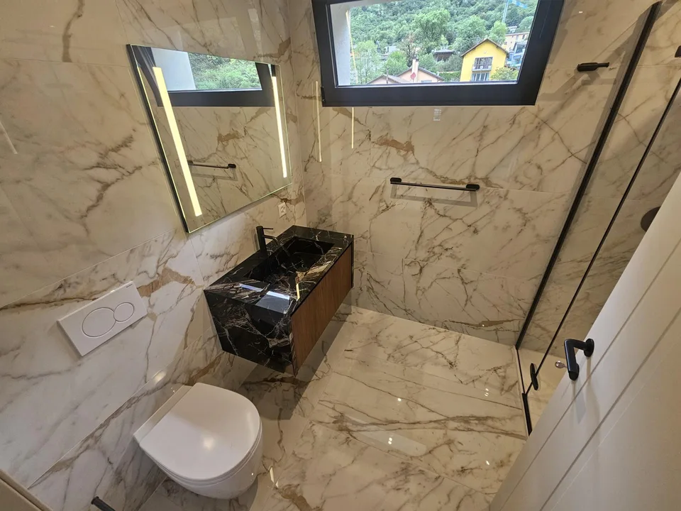 À louer: Nouvel appartement 2.5 pièces avec vue ouverte à Lumino – photo 5 sur 9