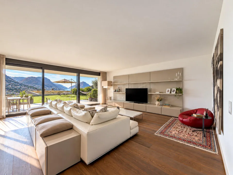 Elegante e prestigioso appartamento con giardino a Porza – photo 3 sur 27