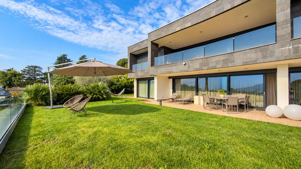 Elegante e prestigioso appartamento con giardino a Porza – photo 15 sur 27
