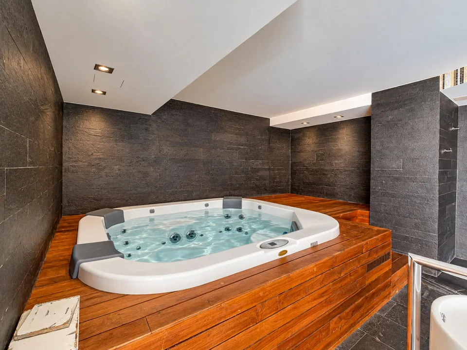 Elegante e prestigioso appartamento con giardino a Porza – photo 19 sur 27
