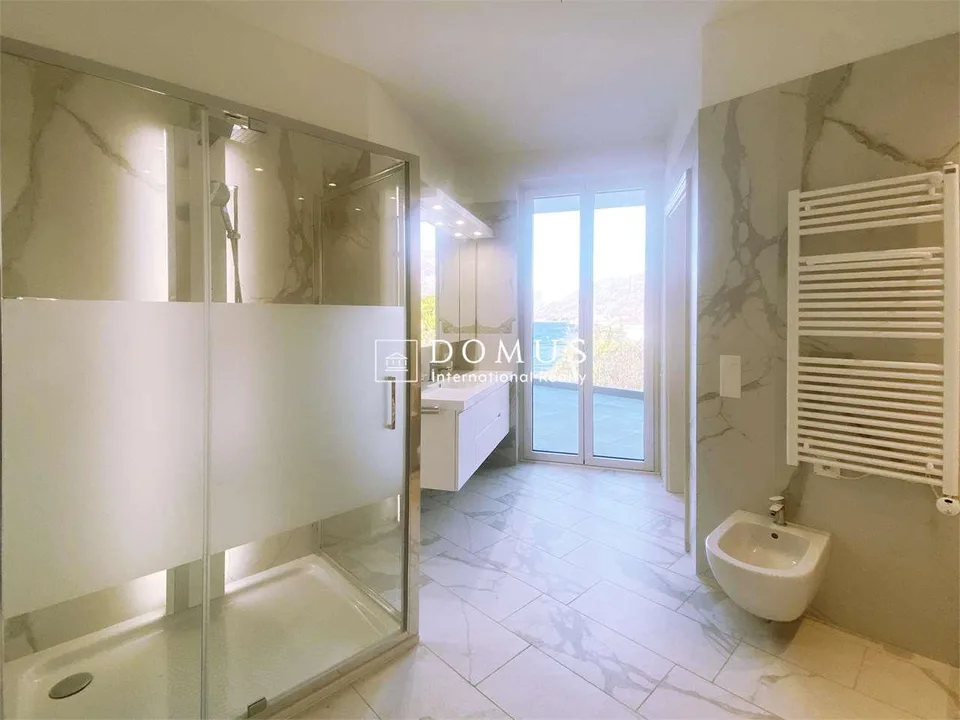 Strepitoso attico 6,5 locali frontelago – Foto 6 von 9