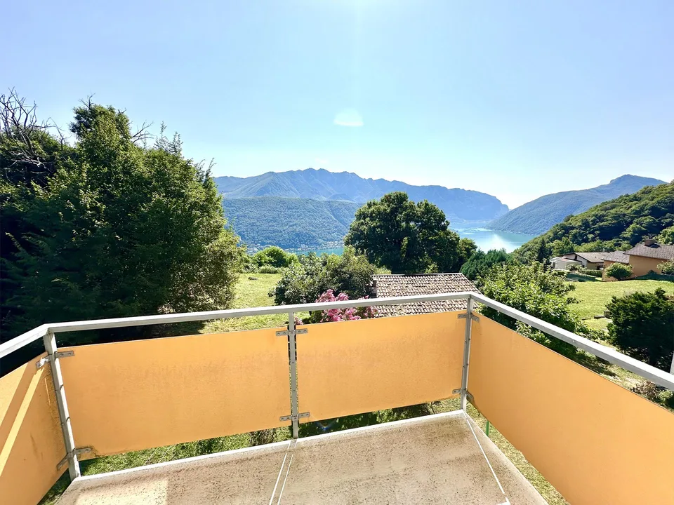 Elegante Attico di 3,5 Locali con Vista sul Lago di Lugano – Foto 9 von 11