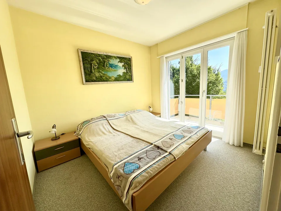 Elegante Attico di 3,5 Locali con Vista sul Lago di Lugano – Foto 8 von 11